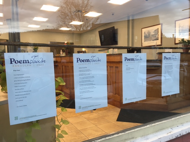 Poem Town broadsides displayed in the window of Bar Harbor Bank, Randolph
